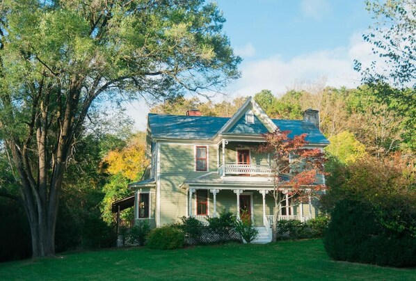 The front of the 1880's Victorian addition which is wrapped around the original 1845 two room cabin!