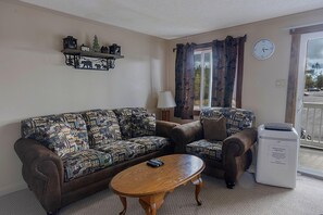Kick back in the living room on the sleeper sofa which accommodates two additional people