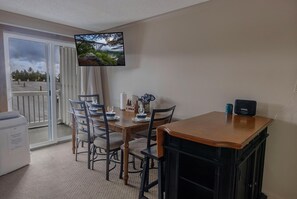 Enjoy meals with your group at the kitchen table that sits four people.