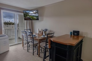 Enjoy meals with your group at the kitchen table that sits four people.