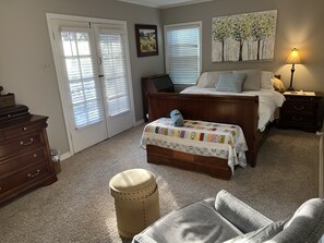 The Mahogany room has a comfy queen size sleigh bed and access to the balcony.