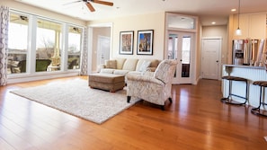 Open floor plan, endless possibilities! Make yourself at home in the inviting living room at Midnight’s Manor.