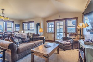 Living Area - Also offers access to the private balcony.