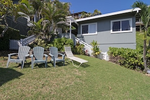 Fenced in yard for lounging or children's play area.