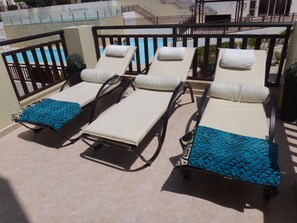 Sunbeds on our balcony - please just bring beach towels, they are not provided.