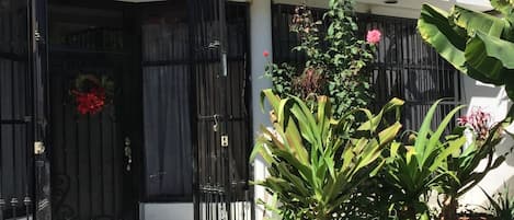 Gated property  with security bars around the house front, back and windows 