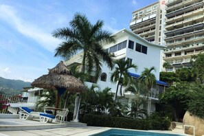 view of the condominium from the pool