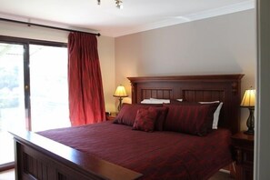 Master bedroom with access to balcony