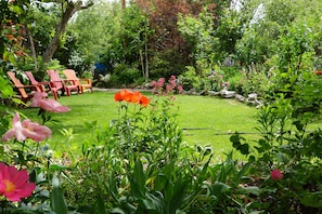 spacious lawn to relax with friends and enjoy the garden