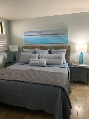Calm relaxing bedroom with high end bedding.