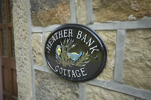 The cottage is awarded four stars by Visit Britain .