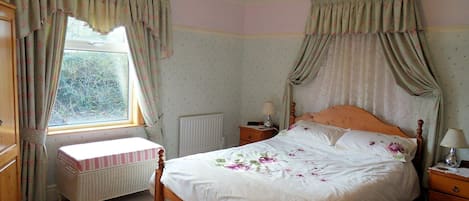 Main bedroom - King size bed, overlooking trees