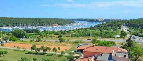 Residential Area, Village, Natural Landscape, Property, Town, Human Settlement, Sky, Neighbourhood, Rural Area, Suburb