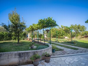 Property, Sky, Tree, Daytime, Real Estate, Garden, Botany, Public Space, Architecture, House