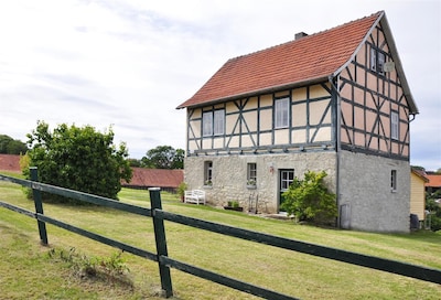 half-timbered house from the 18 century, with view on the Wartburg