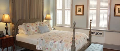 Super comfy bed, plantation shutters, original artwork. City Market just outside