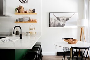 Dining area and bar with view of the mountain.