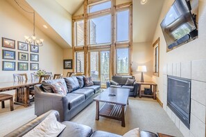 Living Area - Floor to ceiling windows with access to the balcony.