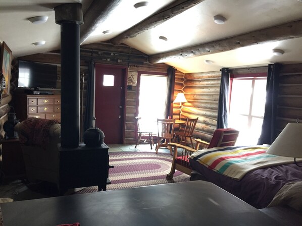 Standing in the kitchen, looking into the cabin.