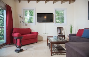 Upstairs living room with 50" satellite flat screen.