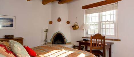 Master Bedroom with kiva fireplace