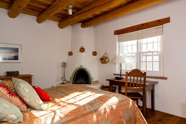 Master Bedroom with kiva fireplace