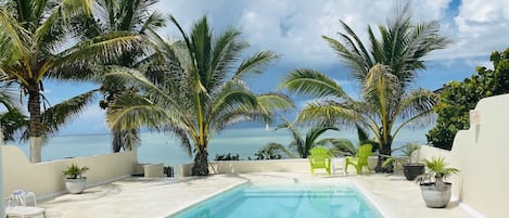 Lovely pool overlooking the beach. 