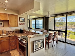 The view from the newly renovated kitchen is spectacular - the ocean calls!