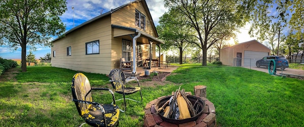 Lodge and garage
Fenced In Yard
Fire pit