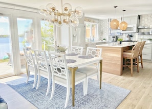 Open floor plan with Williams-Sonoma lighting fixtures & comfortable seating. 