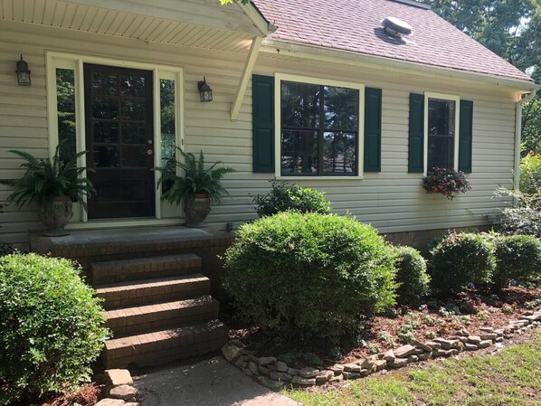 Beautiful front entrance with interior stairway right as you walk in that leads to 2nd level Art Gallery. 