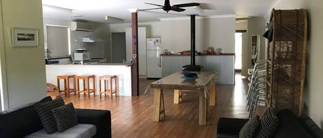 Open plan living area -— entry, kitchen, dining and lounge.