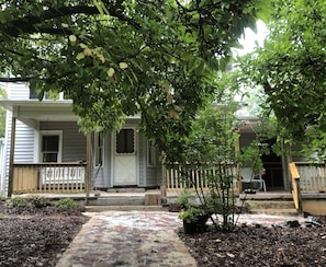 Entrance to patio and front porch--complete with swing and glider.