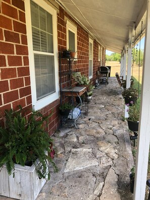 Front porch where you can sit in the porch swing and watch the birds. 