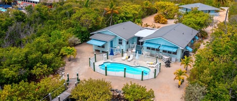 Barry Beach dock for fishing/snorkeling and pool for relaxing.