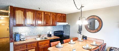 Welcome to Mountain Lodge 102, featuring an updated kitchen with a spacious kitchen island.