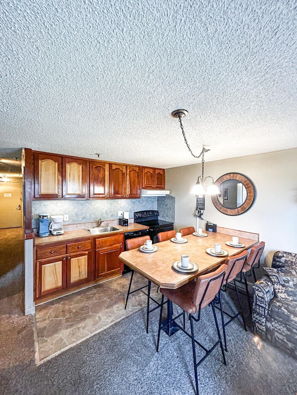 Welcome to Mountain Lodge 102, featuring an updated kitchen with a spacious kitchen island.