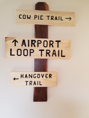 custom made trail signs in the living area