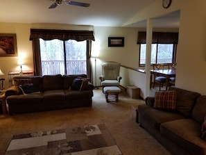 View of Living room...double doors leads out to the oversized deck.