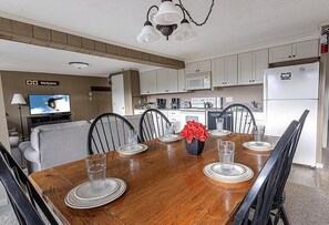 Enjoy meals with your group at the dining room table which sits six people.