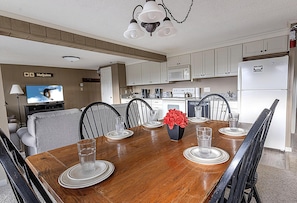 Enjoy meals with your group at the dining room table which sits six people.