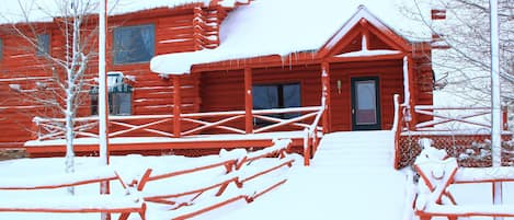 Front porch covered in snow