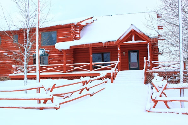 Front porch covered in snow