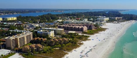 Aerial view of Siesta Breakers, Crescent Beach, and the Gulf of Mexico.
