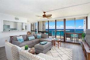 LIVING ROOM WITH FLOOR TO CEILING OCEAN VIEWS