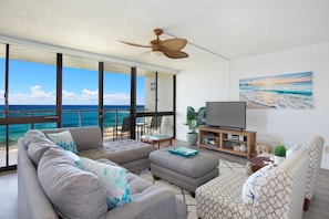 LIVING ROOM WITH FLOOR TO CEILING OCEAN VIEWS