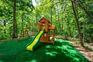 New playset with swing is perfect for the little ones to enjoy -SPACIOUS YARD