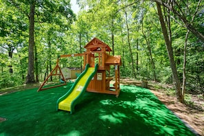 New playset with swing is perfect for the little ones to enjoy -SPACIOUS YARD