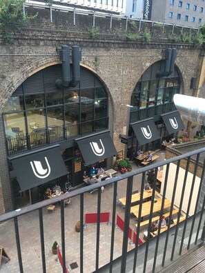 view from roof terrace to theatre and cafe behind

