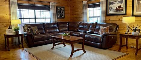 Nicely decorated open space with recliners.